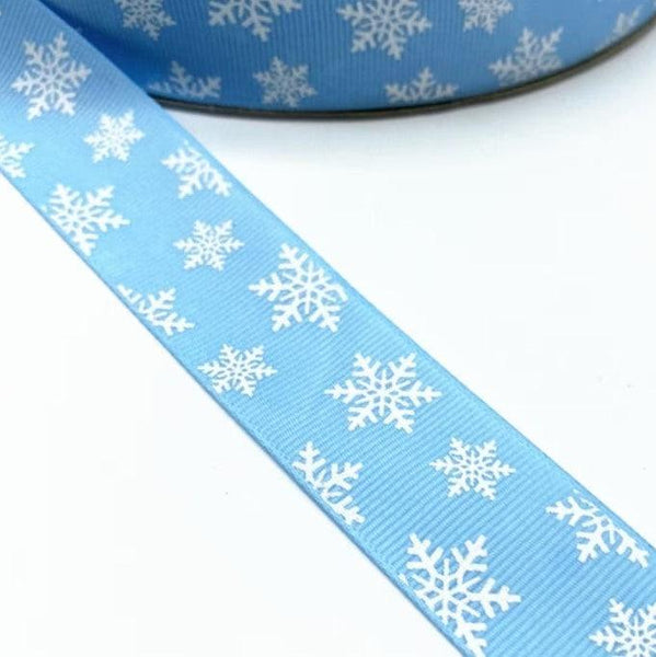 Blue with white Snowflakes 25mm Ribbon per Metre